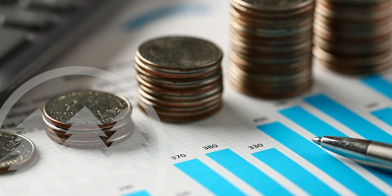 Pile of silver coinsPile of silver coins stand at financial graph papers | hoa financial management