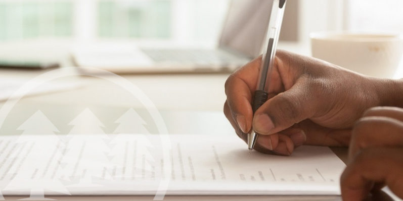 man signing contract paper | importance of vendor contracts