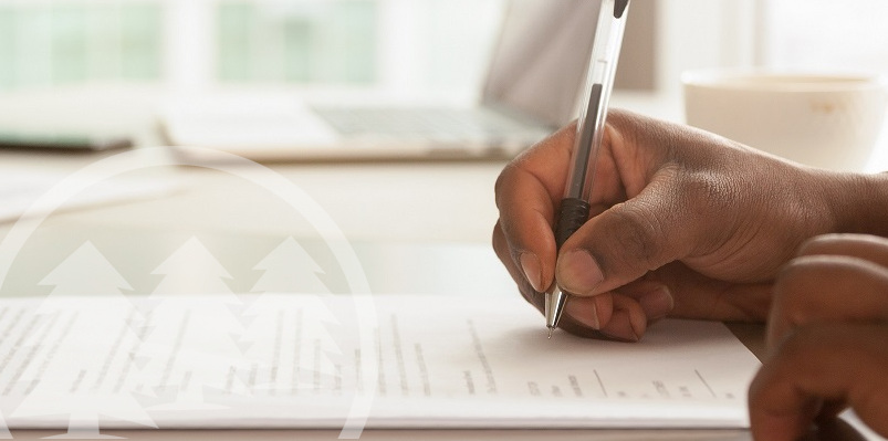 man signing contract paper man signing contract paper | importance of vendor contracts