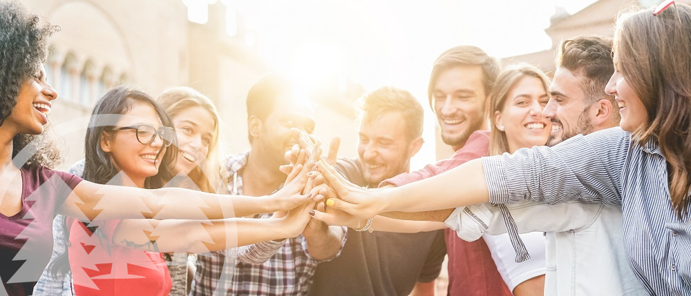 group of people stacking hands together group of people stacking hands together | hoa communication tools