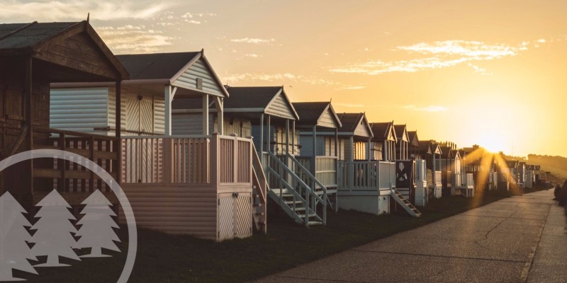 Is Getting D and O Insurance For HOA Boards Necessary a row of residential houses with sunrise | D & O policy for hoa