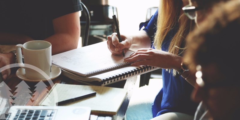 board meetings group of people with notebook and cup | hoa board duties
