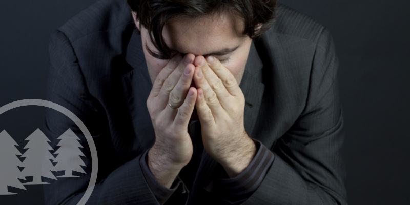 five mistakes problematic man covering his face | hoa financial mistakes