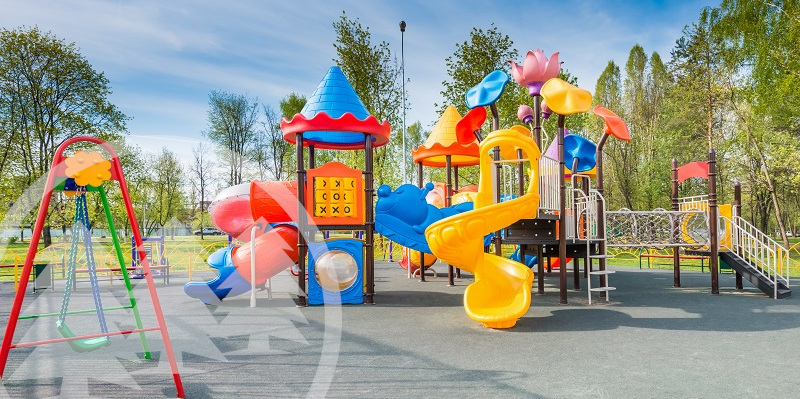 swing carousel in the park for children | hoa amenities