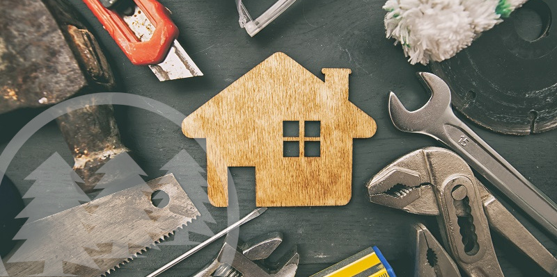 repair tools with wooden house model in the middle repair tools with wooden house model in the middle | what are capital improvements