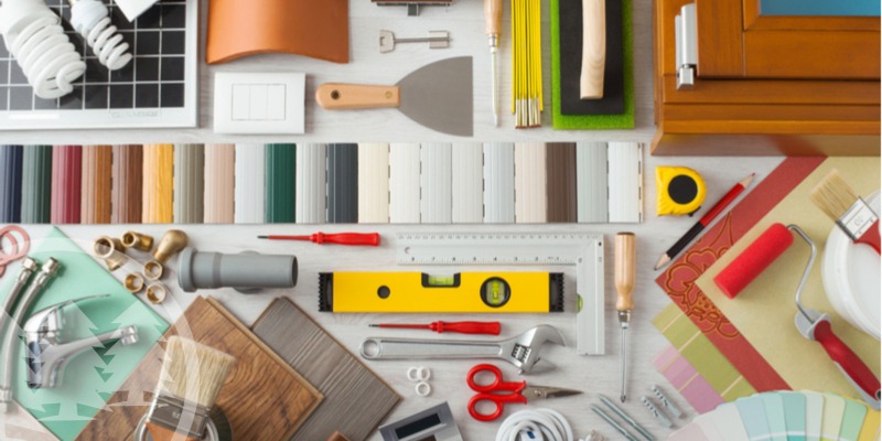 home renovation tools spread on table home renovation tools spread on table | hoa approval