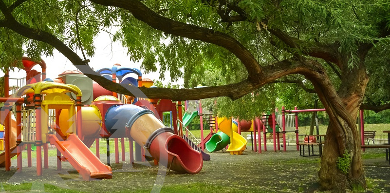 playground in a green park playground in a green park | maintaining playgrounds in HOA