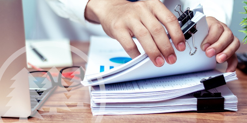 man searching for documents lying on the table man searching for documents lying on the table | hoa resolutions