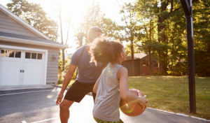 playing basketball in HOA driveway